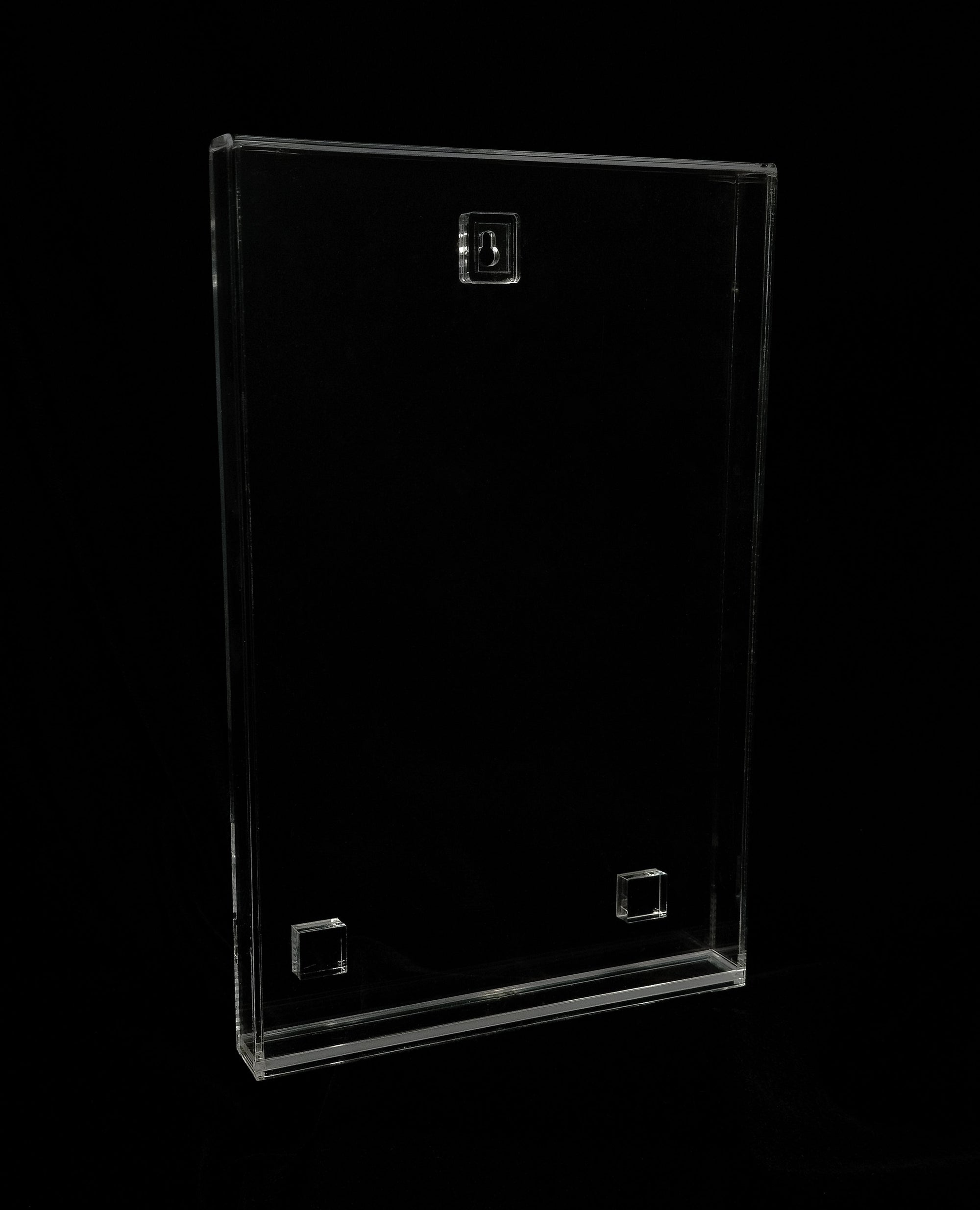 Clear Acrylic comic holder on a black background
