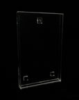 Clear Acrylic comic holder on a black background