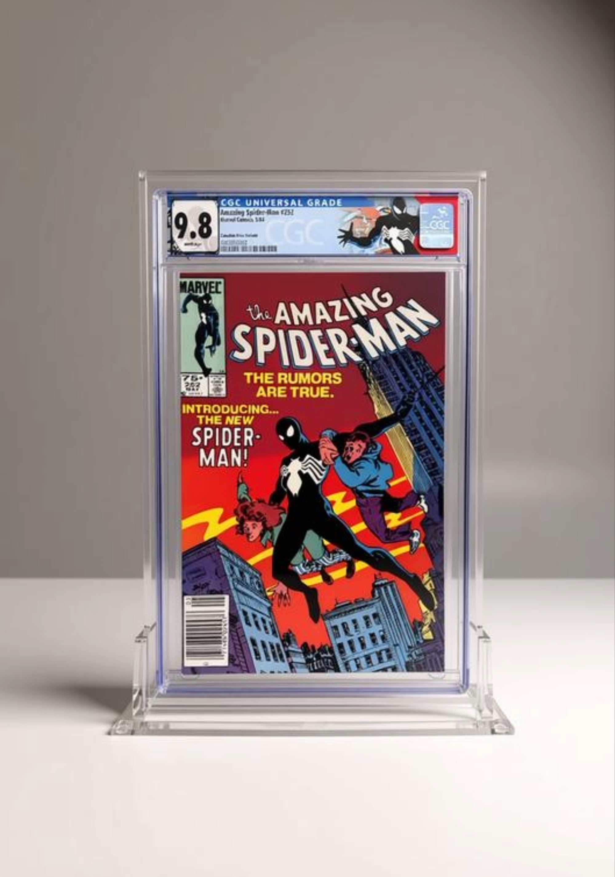 Comic book 'The Amazing Spider-Man' in a display case with a gray background